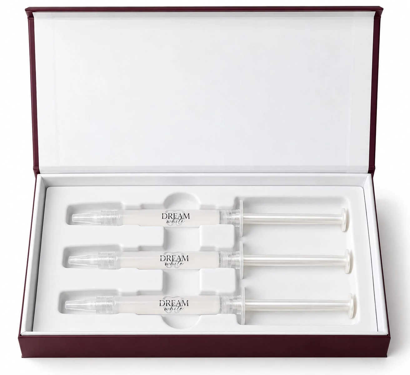 Geöffnete Dreamwhite-Box von oben mit drei Gel-Applikatoren in der weißen Einlage